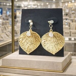 Gold earrings with rhinestone decor